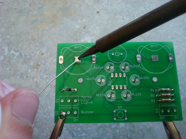 A picture of the battery pad being soldered.