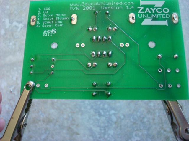 A picture of the soldered button.