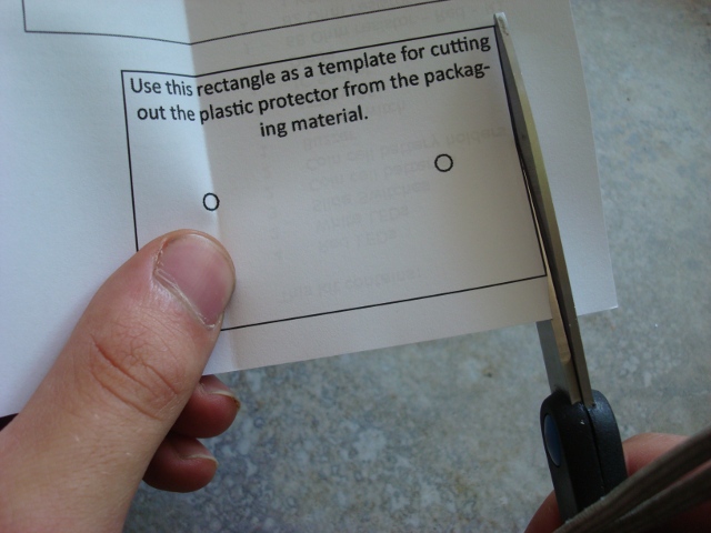 A picture of the template being cut.