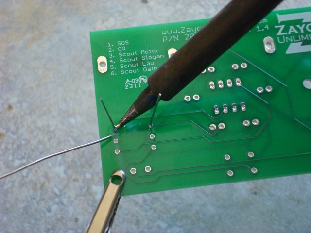 A picture of the resistor being soldered.
